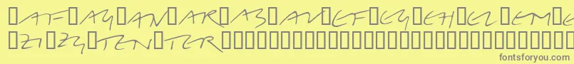 LinotypeBelleBonus-fontti – harmaat kirjasimet keltaisella taustalla