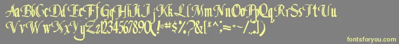 Classicfont104RegularTtcon-Schriftart – Gelbe Schriften auf grauem Hintergrund