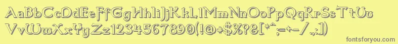 フォントDum3shad – 黄色の背景に灰色の文字