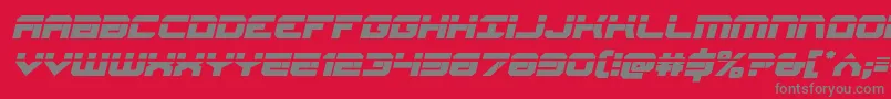 Gearheadlaserital-Schriftart – Graue Schriften auf rotem Hintergrund