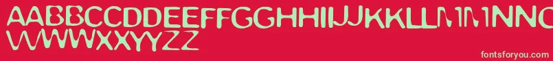 TrappedLight Font – Green Fonts on Red Background