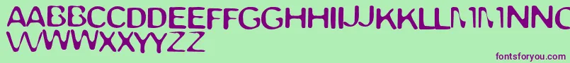 TrappedLight Font – Purple Fonts on Green Background