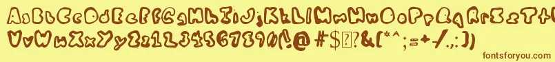 Шрифт MyBaldFriendFred – коричневые шрифты на жёлтом фоне
