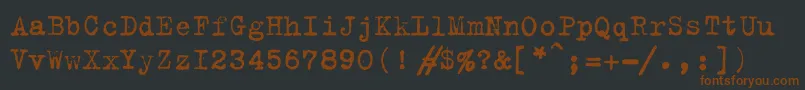 Шрифт Trixiec – коричневые шрифты на чёрном фоне