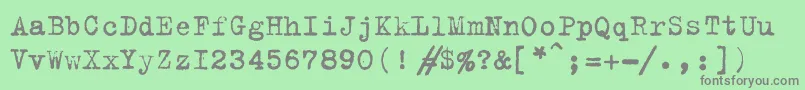 フォントTrixiec – 緑の背景に灰色の文字