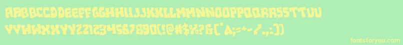 フォントBeastianrotate – 黄色の文字が緑の背景にあります