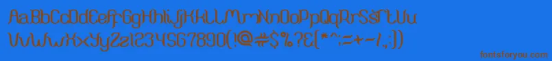 ArunaAiraJasmine Font – Brown Fonts on Blue Background