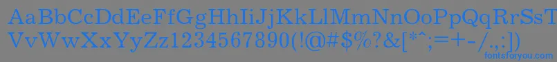 フォントJournalc – 灰色の背景に青い文字