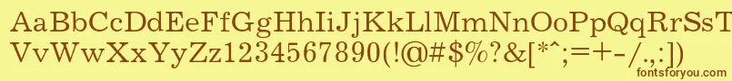 Шрифт Journalc – коричневые шрифты на жёлтом фоне