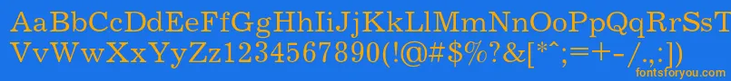 フォントJournalc – オレンジ色の文字が青い背景にあります。