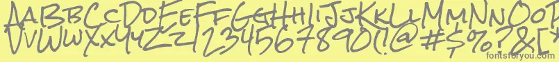 Rocksalt-fontti – harmaat kirjasimet keltaisella taustalla