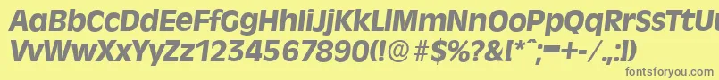 RavennaserialXboldItalic-fontti – harmaat kirjasimet keltaisella taustalla
