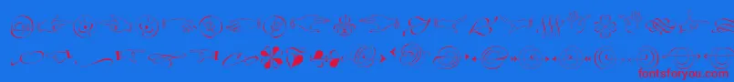 Czcionka ZapfinoextraltOrnaments – czerwone czcionki na niebieskim tle