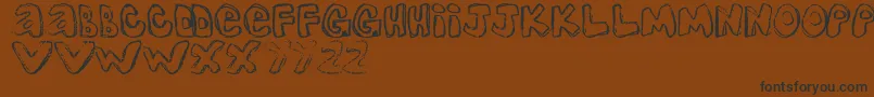 OneLousyBottom Font – Black Fonts on Brown Background