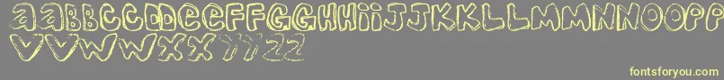 OneLousyBottom Font – Yellow Fonts on Gray Background