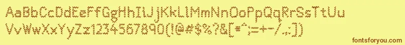 Quantumwaves0p1 Font – Brown Fonts on Yellow Background