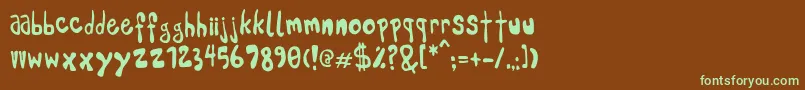 フォントPleej – 緑色の文字が茶色の背景にあります。