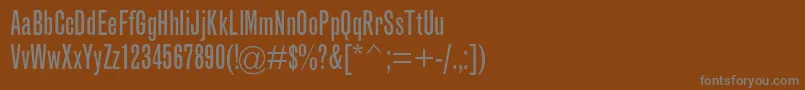 フォントGrotesquemtstdExtracond – 茶色の背景に灰色の文字