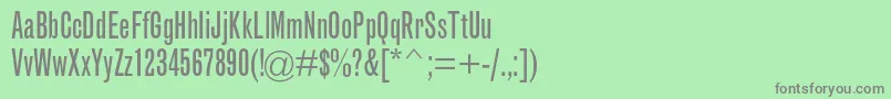 フォントGrotesquemtstdExtracond – 緑の背景に灰色の文字