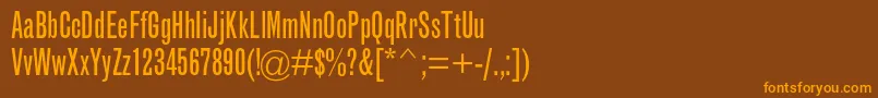 Fonte GrotesquemtstdExtracond – fontes laranjas em um fundo marrom