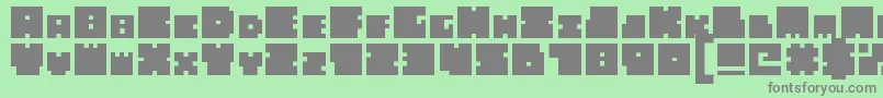Fonte BigBadBlocks – fontes cinzas em um fundo verde