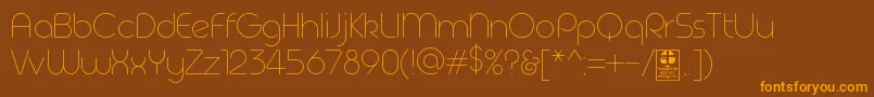 GeomaThinDemo-Schriftart – Orangefarbene Schriften auf braunem Hintergrund