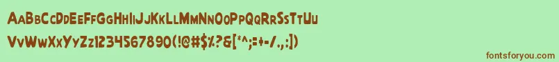 QuartermainCondensed Font – Brown Fonts on Green Background