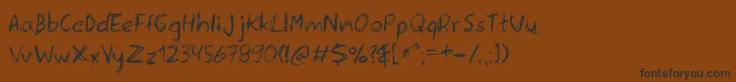 Sererg Font – Black Fonts on Brown Background