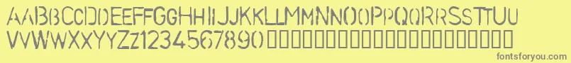 Stenb-Schriftart – Graue Schriften auf gelbem Hintergrund