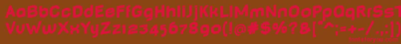 BabyMinefatJumping-fontti – punaiset fontit ruskealla taustalla