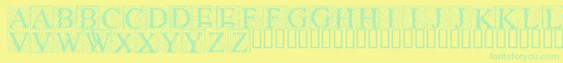 Lowengravedcapslight Font – Green Fonts on Yellow Background