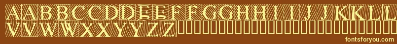Lowengravedcapslight-fontti – keltaiset fontit ruskealla taustalla
