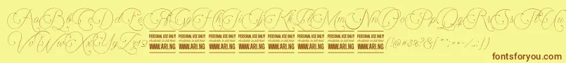 Encinascript1Personal Font – Brown Fonts on Yellow Background