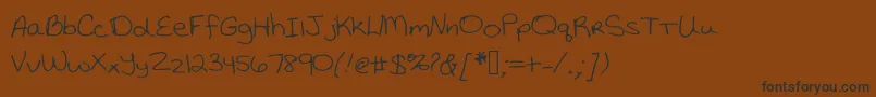 Katiethompsonshandwriting Font – Black Fonts on Brown Background