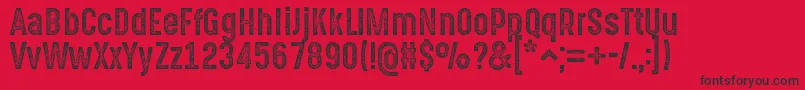 GotchaGothicStampBasic Font – Black Fonts on Red Background