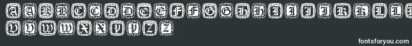 Xmascapsround-fontti – valkoiset fontit mustalla taustalla