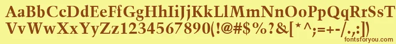 フォントTrumpMediaevalLtBold – 茶色の文字が黄色の背景にあります。