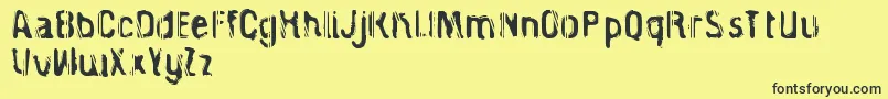 CagedPrisoner Font – Black Fonts on Yellow Background