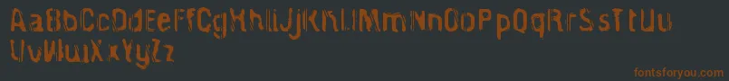 CagedPrisoner Font – Brown Fonts on Black Background