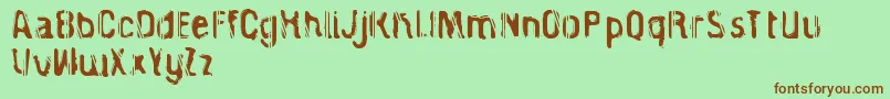 CagedPrisoner Font – Brown Fonts on Green Background