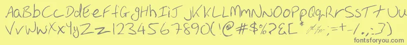 フォントOakhill – 黄色の背景に灰色の文字