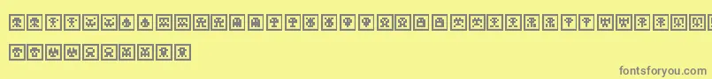 フォントScumskullzBox – 黄色の背景に灰色の文字