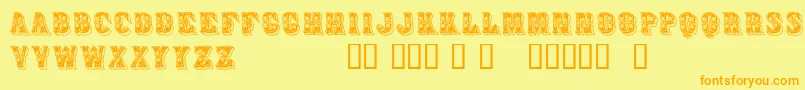フォントAzteak – オレンジの文字が黄色の背景にあります。