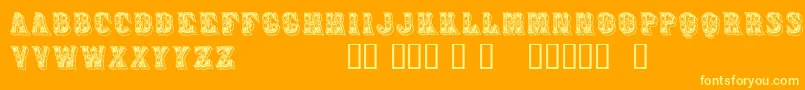 Azteak-Schriftart – Gelbe Schriften auf orangefarbenem Hintergrund