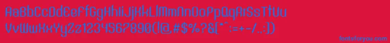 Czcionka SntAnouvongMediumRegular – niebieskie czcionki na czerwonym tle