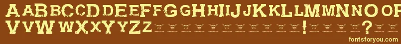 GunfighteracademyRegular-fontti – keltaiset fontit ruskealla taustalla