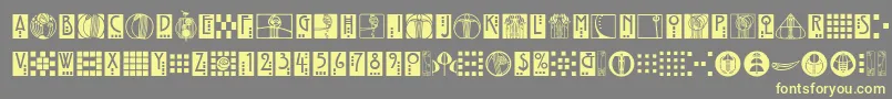 RenniemackornamentsitcTt Font – Yellow Fonts on Gray Background