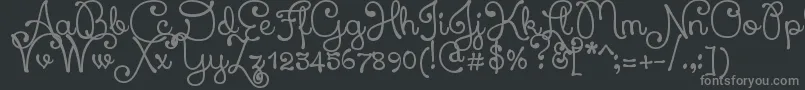 XiomaraScript-fontti – harmaat kirjasimet mustalla taustalla