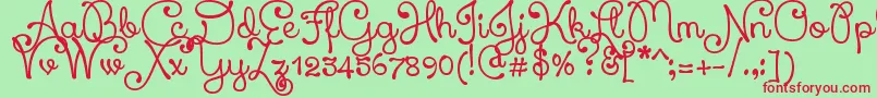 XiomaraScript Font – Red Fonts on Green Background