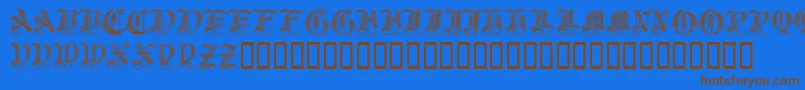 Royalinitialen Font – Brown Fonts on Blue Background